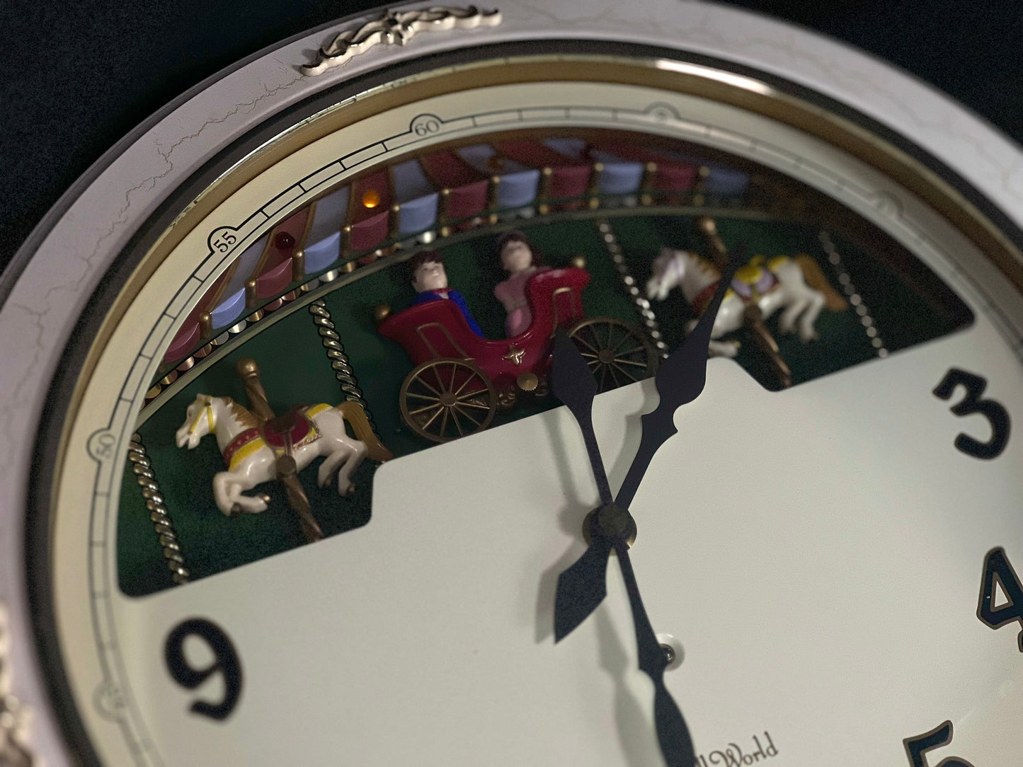Rhythm “Small World Ceremony 2” Magic Motion Musical Wall Clock with Moving Carousel and Surprise Dial Animation - 4MH653RH10