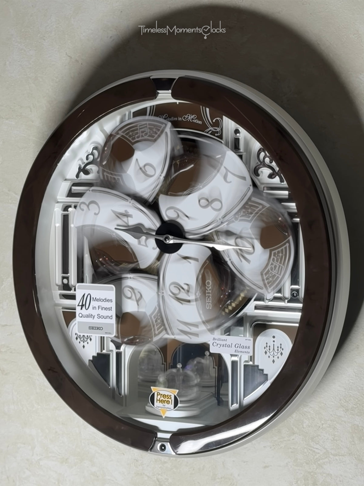 Seiko QXM615BRH “Snow Castle” Melodies in Motion Dancing Dial Musical Wall Clock with 40 Songs