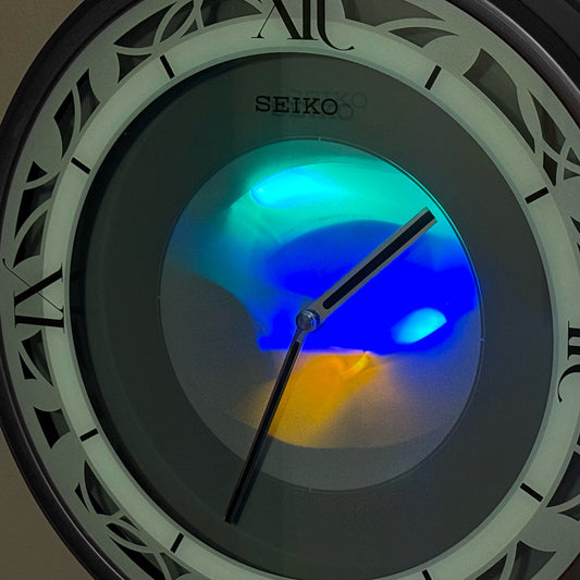 Seiko QXS003KRH "Zen Time" Metallic Black Modern Musical Wall Clock with LED Light Show & 4 Original Melodies