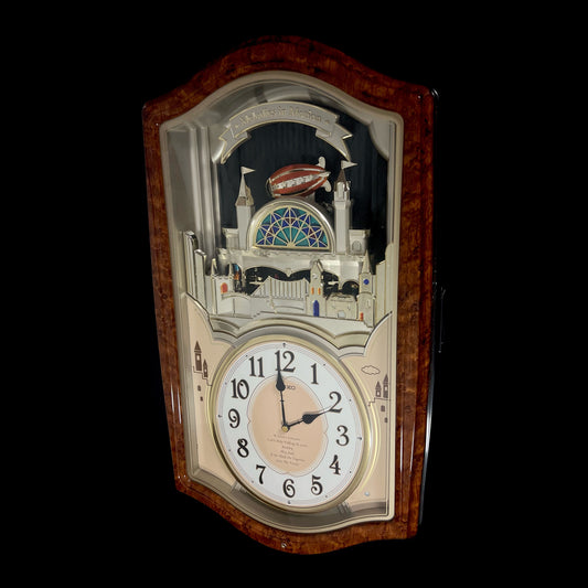 Seiko QXM135BRH "Lover’s Castle" Melodies in Motion Musical Moving Wall Clock with Popular Melodies