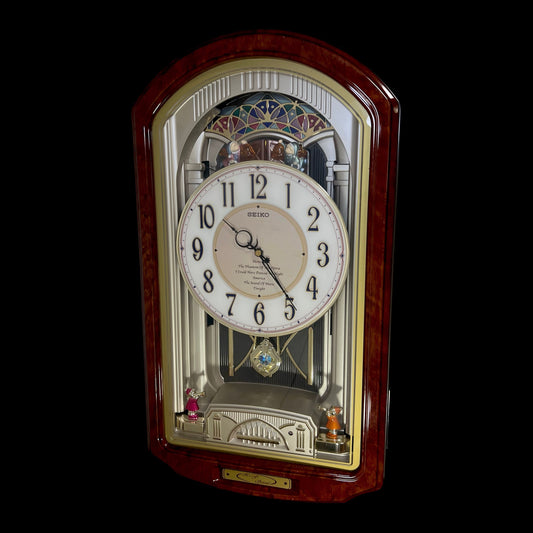 Seiko QXM123BRH "Broadway Showtunes Dropping Dial" Melodies in Motion Musical Moving Wall Clock with Popular Melodies