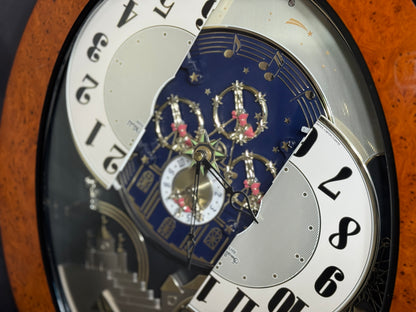 Rhythm “DWS Timecracker” Moving Dial Magic Motion Musical Wooden Wall Clock with Popular Melodies - 4MH752-R06