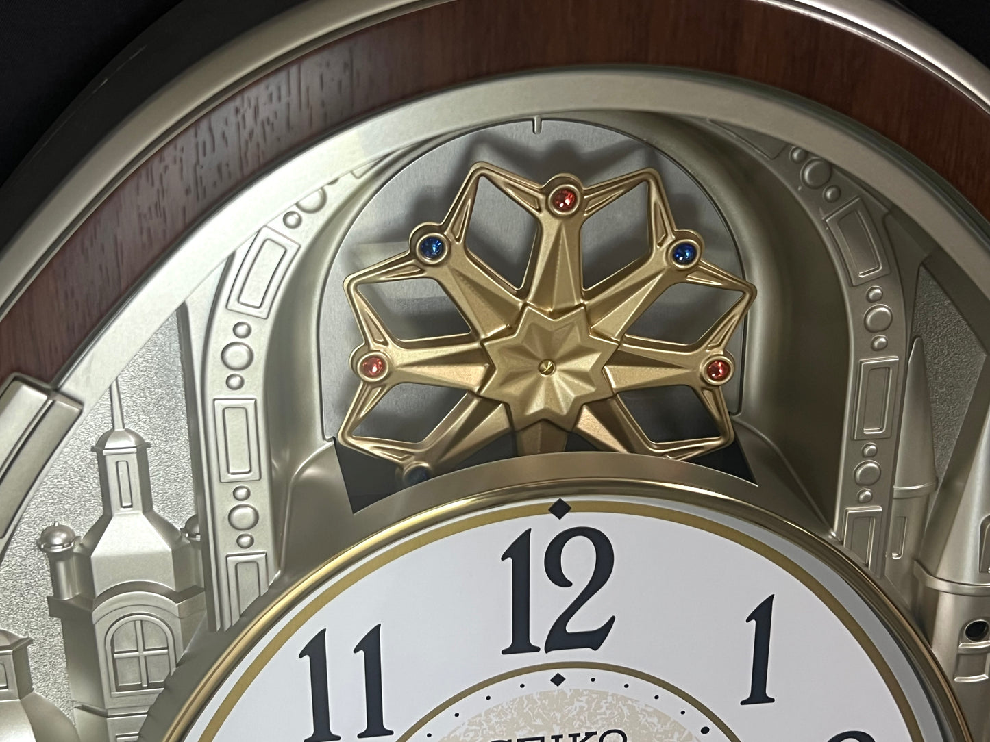 Seiko QXM369BRH “Golden Citadel” Melodies in Motion Musical Decorative Pendulum Wall Clock