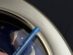 Rhythm “Peaceful Cosmos” Moving Earth Dial Magic Motion Musical Wall Clock with Popular Melodies - 4MH751AR19
