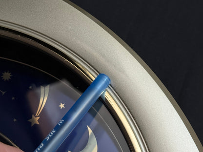 Rhythm “Peaceful Cosmos” Moving Earth Dial Magic Motion Musical Wall Clock with Popular Melodies - 4MH751AR19