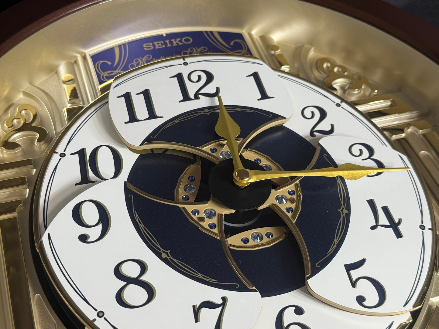 Seiko QXM541BRH "2014 Special Collector's Edition" Melodies in Motion Dancing Dial Musical Wall Clock with Music by The Beatles