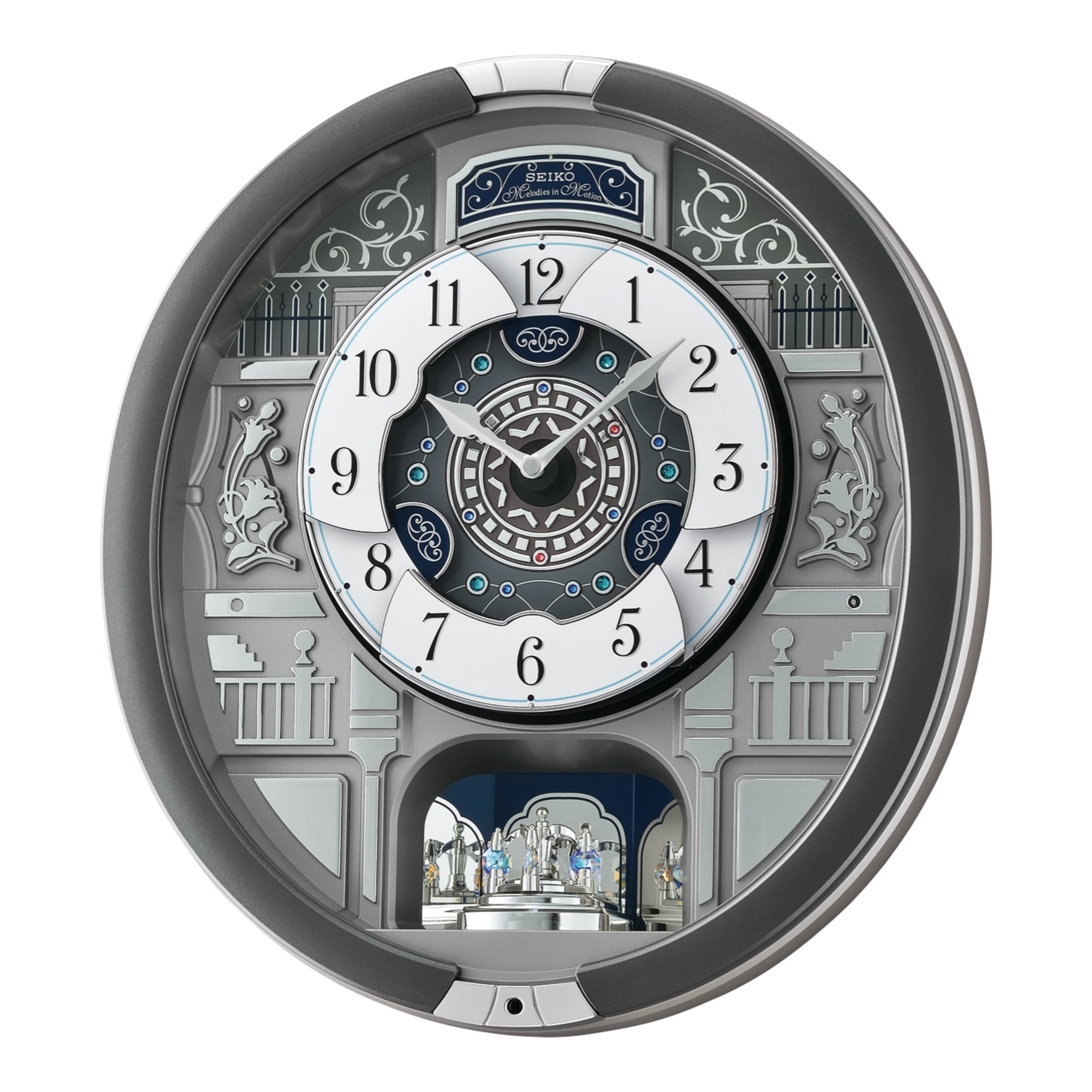 Seiko QXM366SRH “Musical Motifs” Melodies in Motion Dancing Dial Musical Wall Clock with 18 Songs