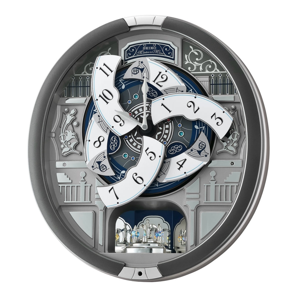 Seiko QXM366SRH “Musical Motifs” Melodies in Motion Dancing Dial Musical Wall Clock with 18 Songs
