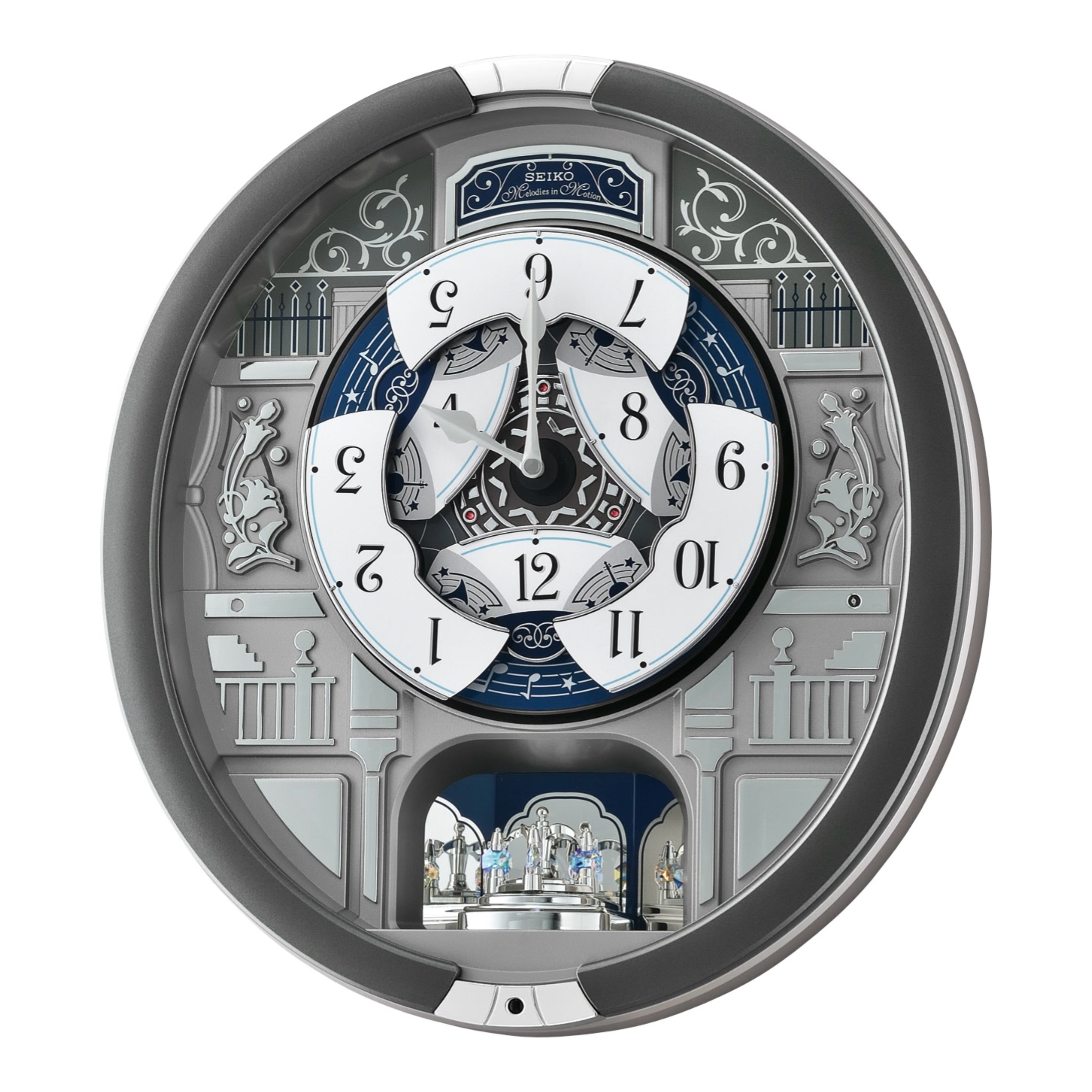 Seiko QXM366SRH “Musical Motifs” Melodies in Motion Dancing Dial Musical Wall Clock with 18 Songs