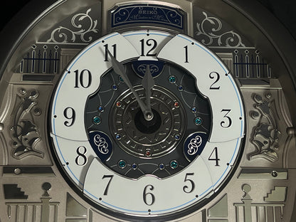 Seiko QXM366SRH “Musical Motifs” Melodies in Motion Dancing Dial Musical Wall Clock