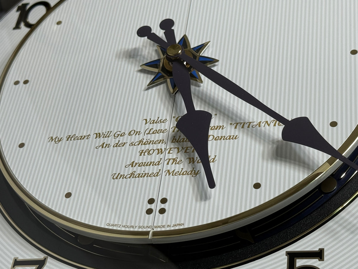 Rhythm “Small World Partage Home (Blue)” Moving Dial Magic Motion Musical Wall Clock with Popular Melodies - 4MH754RH04