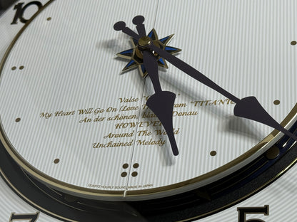 Rhythm “Small World Partage Home (Blue)” Moving Dial Magic Motion Musical Wall Clock with Popular Melodies - 4MH754RH04