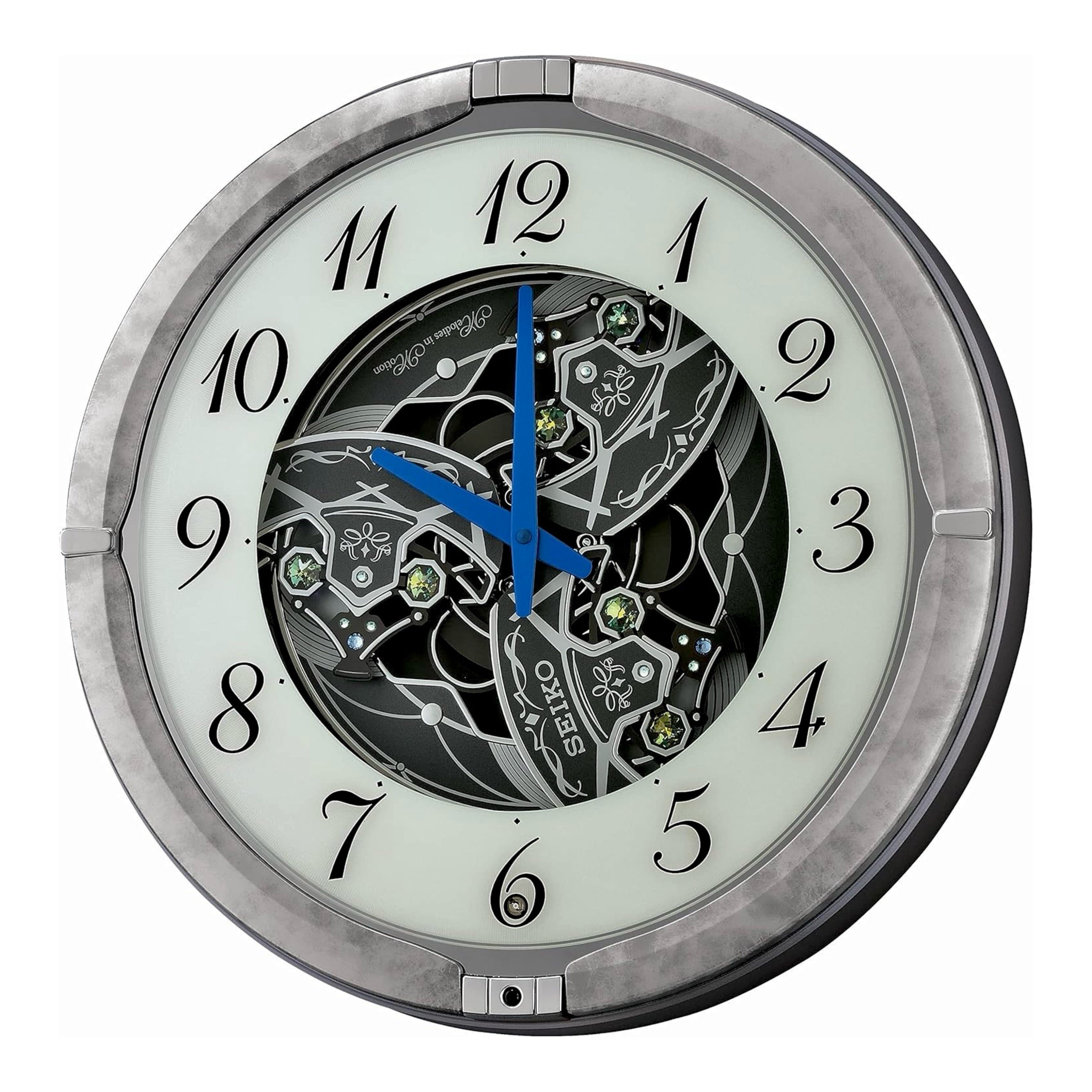 Seiko QXM397SRH “Winter King” Melodies in Motion Dancing Dial Musical Wall Clock with 36 Songs
