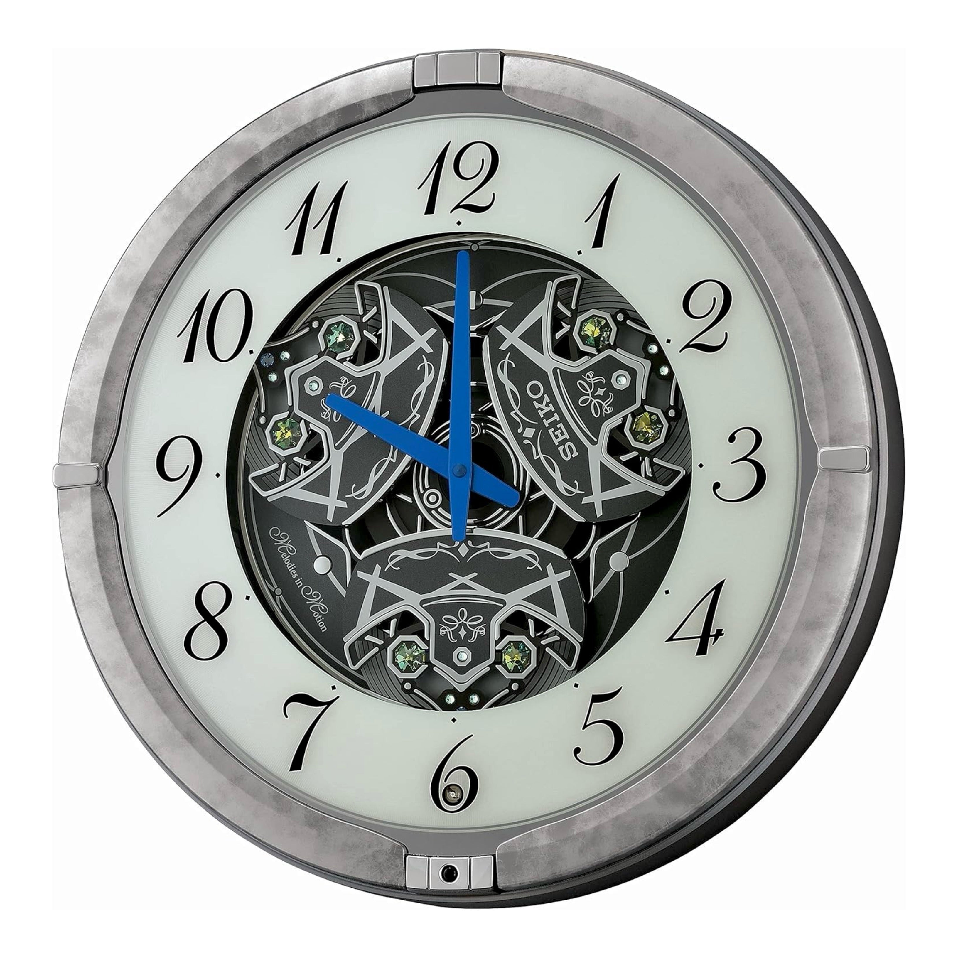 Seiko QXM397SRH “Winter King” Melodies in Motion Dancing Dial Musical Wall Clock with 36 Songs