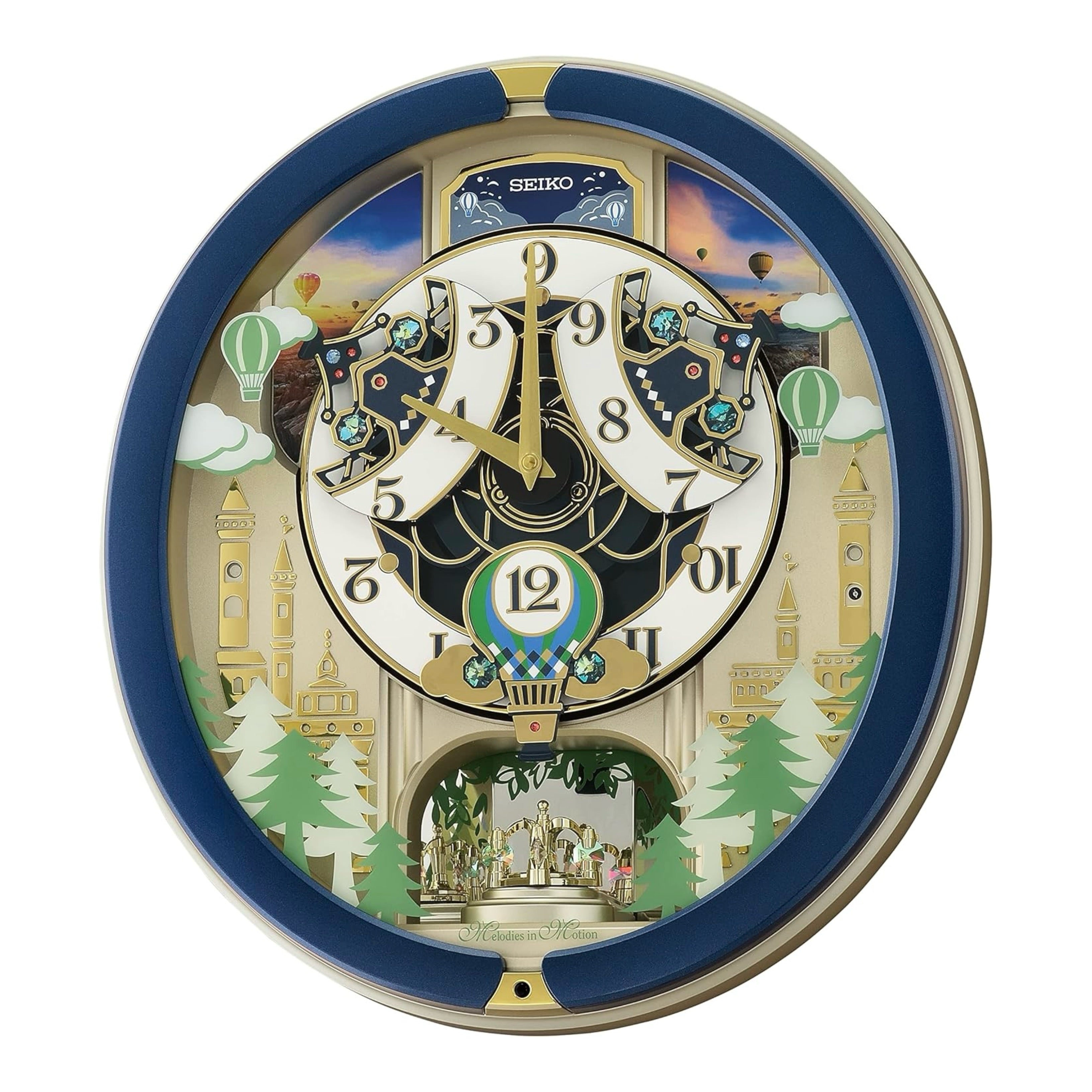 Seiko QXM398LRH “Blue Pine Fantasy” Melodies in Motion Dancing Dial Musical Wall Clock with 40 Songs