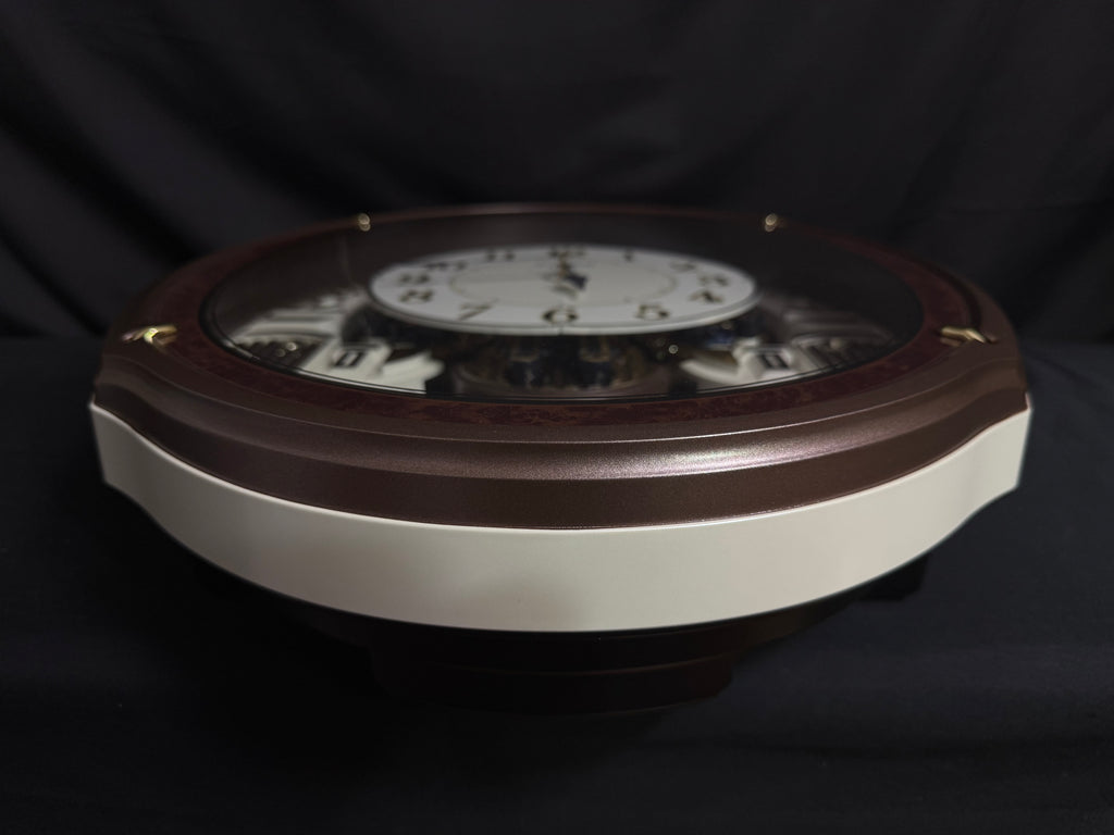 Rhythm "Harmony Blessing" Moving Dial Magic Motion Musical Wall Clock - 4MH423WR23