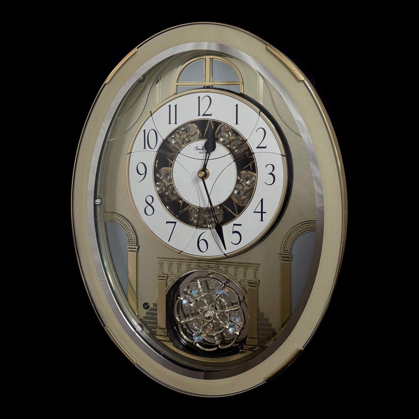 Rhythm "Classic Brilliance" Moving Dial Magic Motion Musical Wall Clock - 4MH787PD18