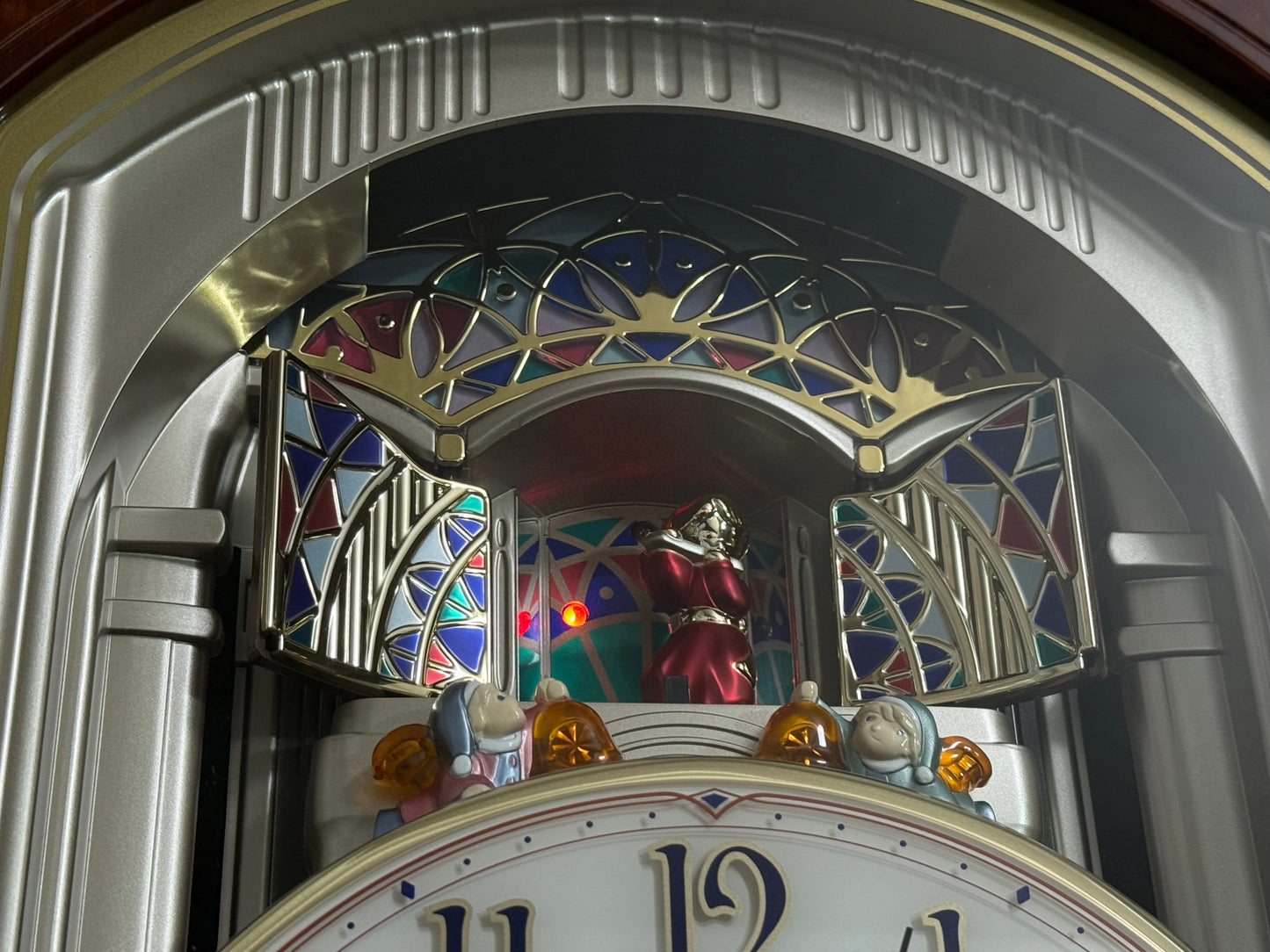 Seiko QXM123BRH "Broadway Showtunes Dropping Dial" Melodies in Motion Musical Moving Wall Clock with Popular Melodies