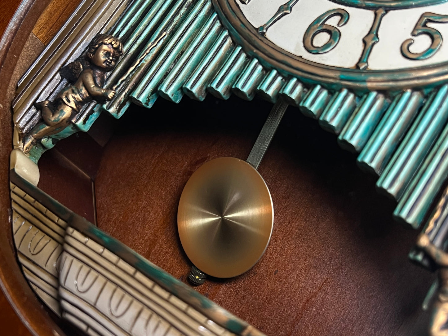 Rhythm “CTS Sundial” Gothic Wooden Musical Motion Pendulum Wall Clock with Popular Melodies - CMJ336UR06