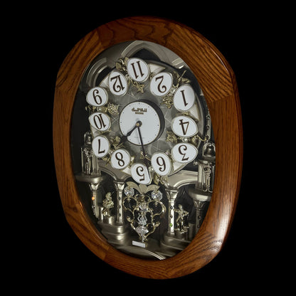 Rhythm "SSS Encore" Magic Motion Musical Wooden Wall Clock with Animated Moving Dial and Popular Melodies - 4MH810-R06