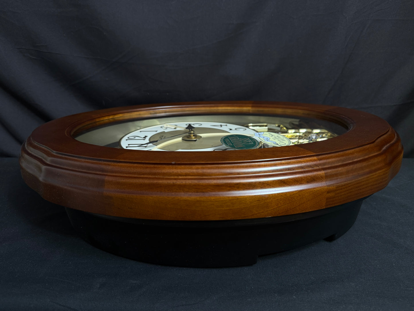Rhythm "CTS Nostalgia" Moving Dial Magic Motion Musical Wooden Wall Clock with Popular Melodies - 4MH780-R06
