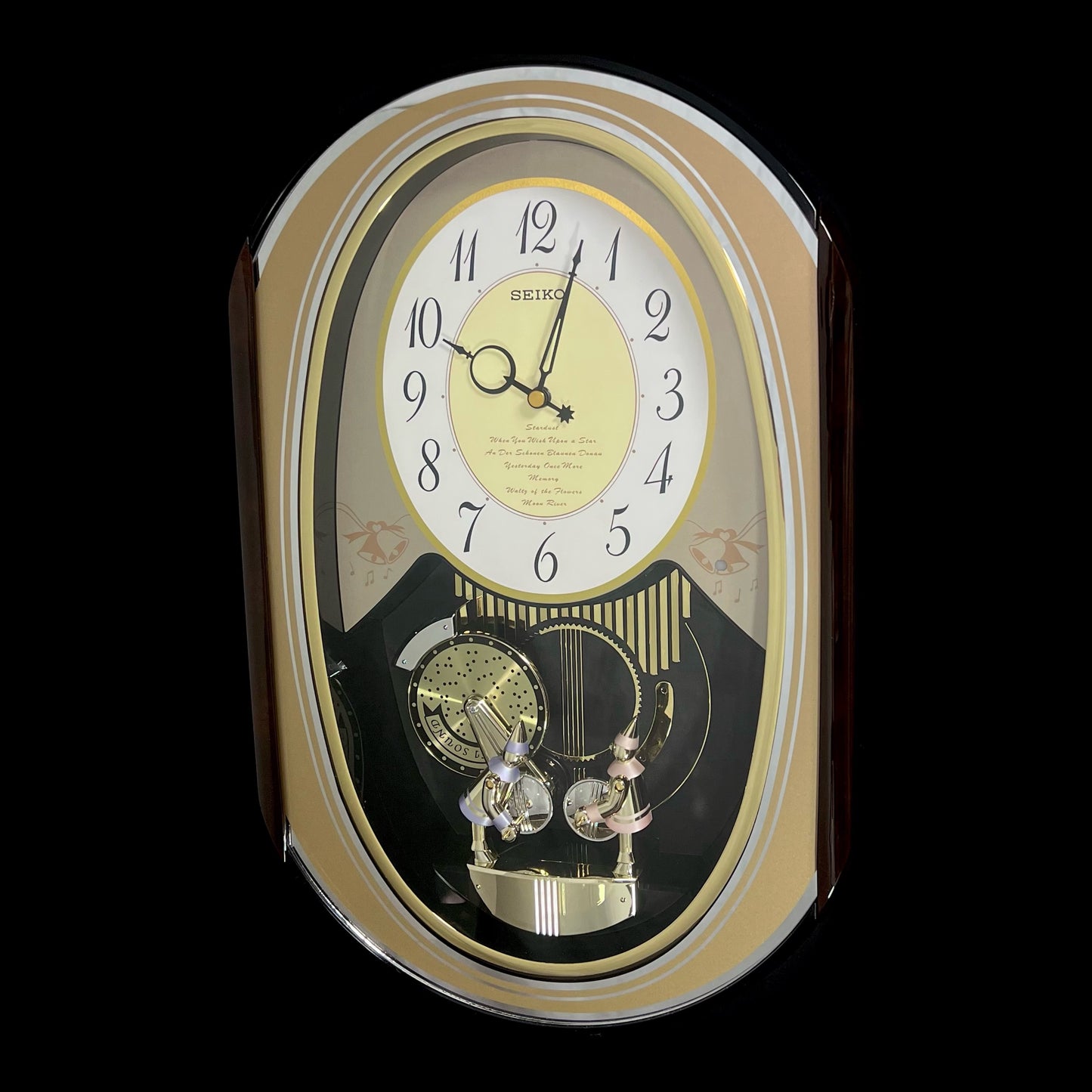 Seiko QXM124GRH "Music Disc Figurines" Melodies in Motion Musical Moving Wall Clock with Popular Music