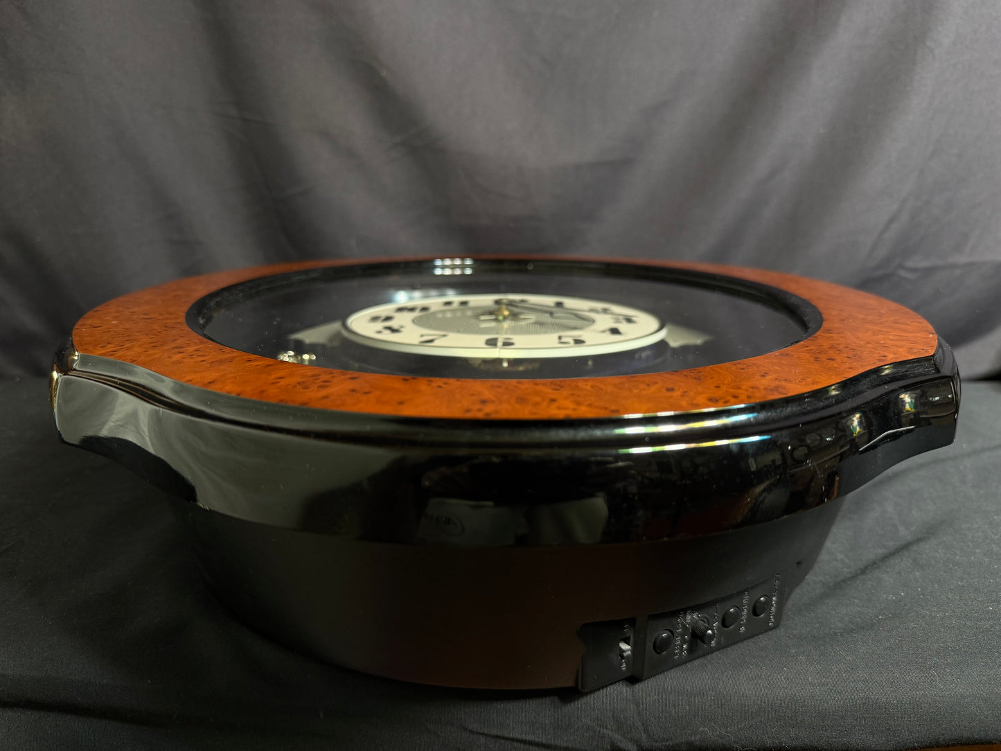 Rhythm “DWS Timecracker” Moving Dial Magic Motion Musical Wooden Wall Clock with Popular Melodies - 4MH752-R06