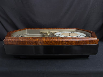 Seiko QXM135BRH "Lover’s Castle" Melodies in Motion Musical Moving Wall Clock with Popular Melodies