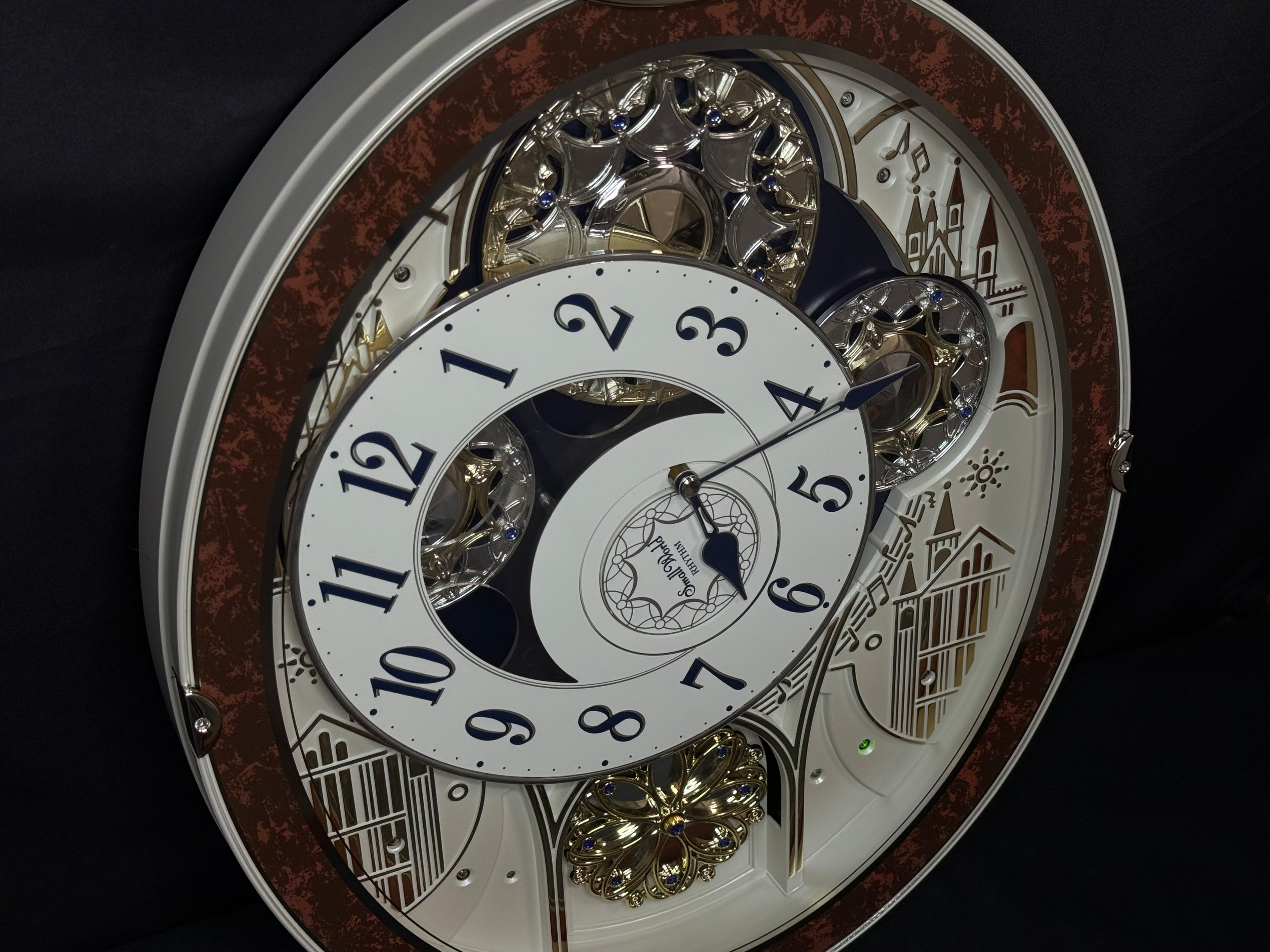 Rhythm "Gala III" Magic Motion Musical Wall Clock with Rotating Dial - 4MH447WU23