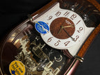 Rhythm “Concerto Entertainer II” Musical Motion Decorative Pendulum Wall Clock - 4MH889WU23