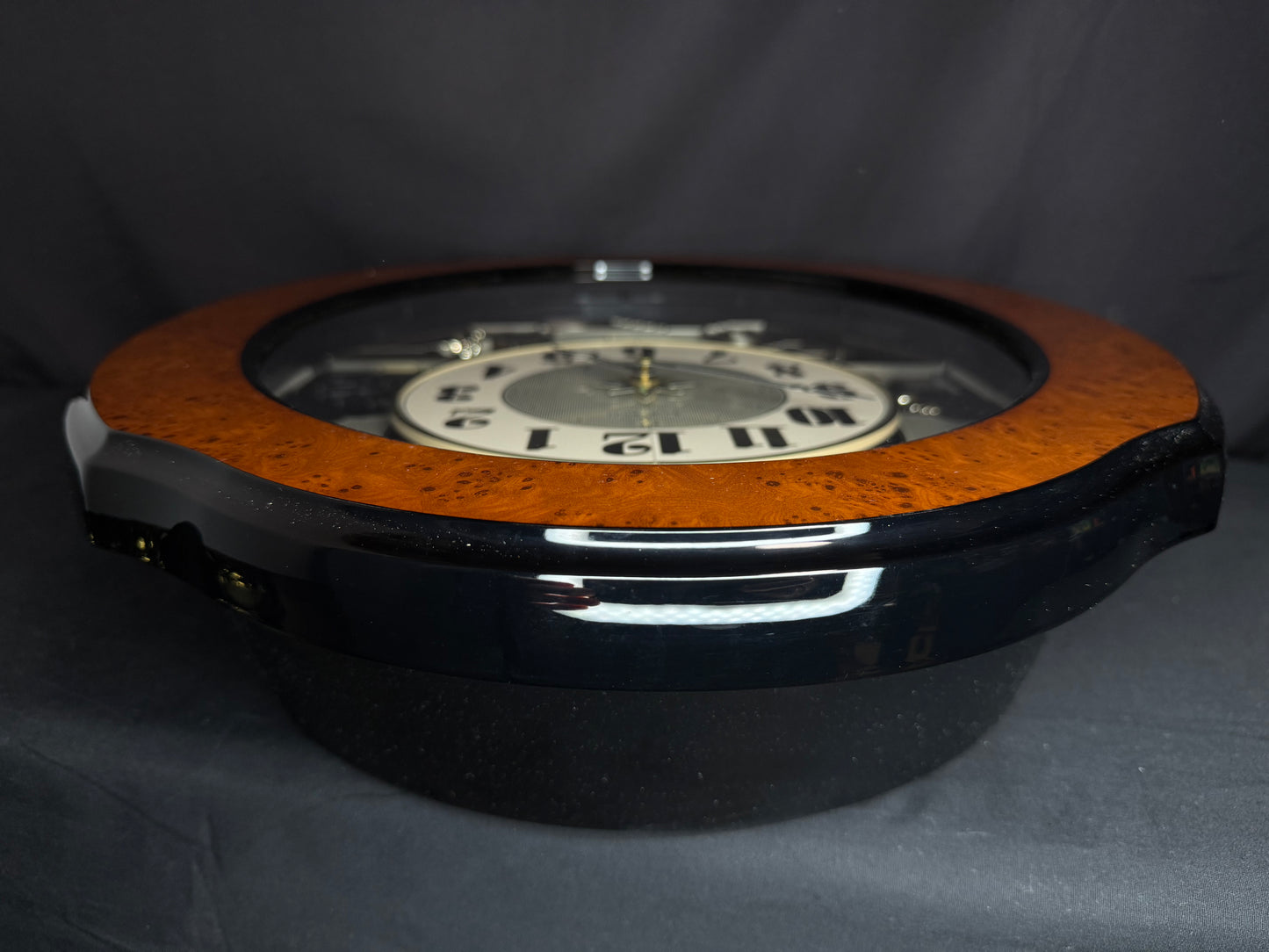 Rhythm “DWS Timecracker” Moving Dial Magic Motion Musical Wooden Wall Clock with Popular Melodies - 4MH752-R06