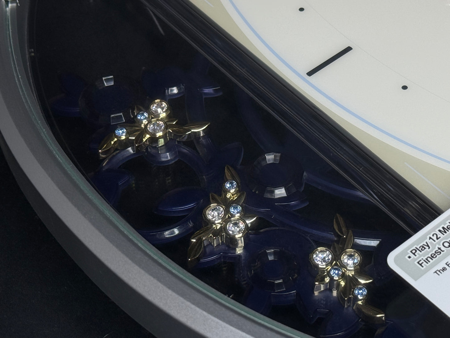 Seiko QXM158SRH "Sparkling Crystals" Melodies in Motion Musical Decorative Pendulum Wall Clock