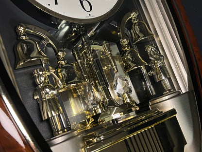 Rhythm "Golden Ringers" Magic Motion Musical Wall Clock with Animated Figurines - 4MH740NR23