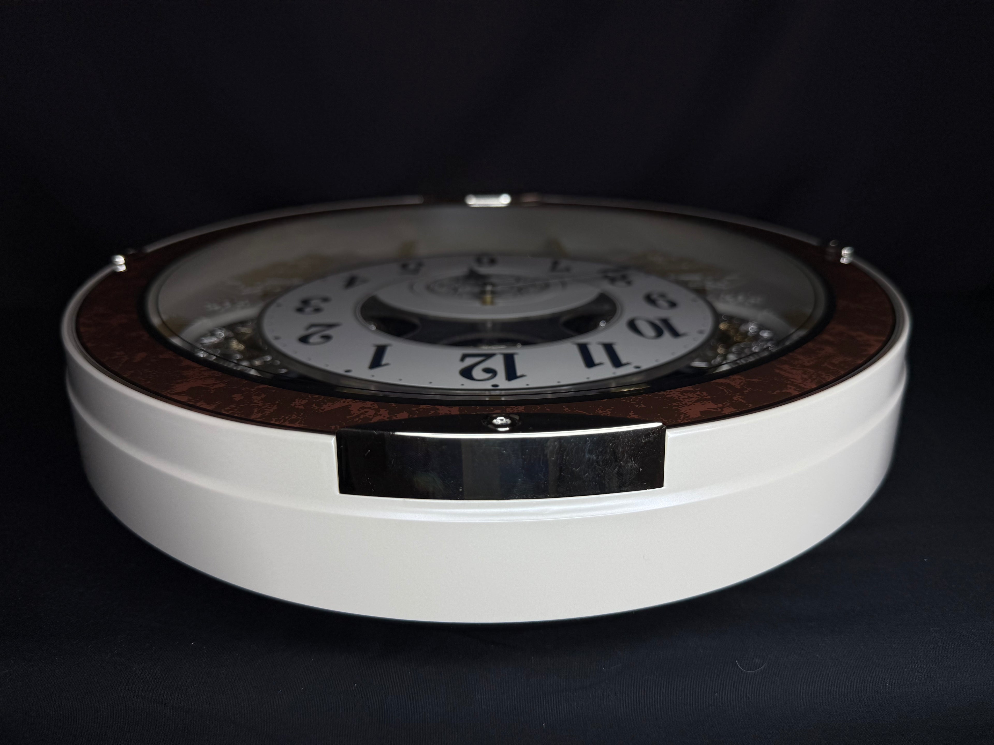 Rhythm "Gala III" Magic Motion Musical Wall Clock with Rotating Dial - 4MH447WU23