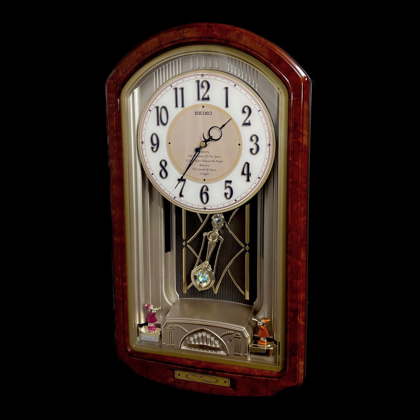 Seiko QXM123BRH "Broadway Showtunes Dropping Dial" Melodies in Motion Musical Moving Wall Clock with Popular Melodies