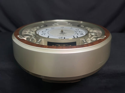 Seiko QXM369BRH “Golden Citadel” Melodies in Motion Musical Decorative Pendulum Wall Clock