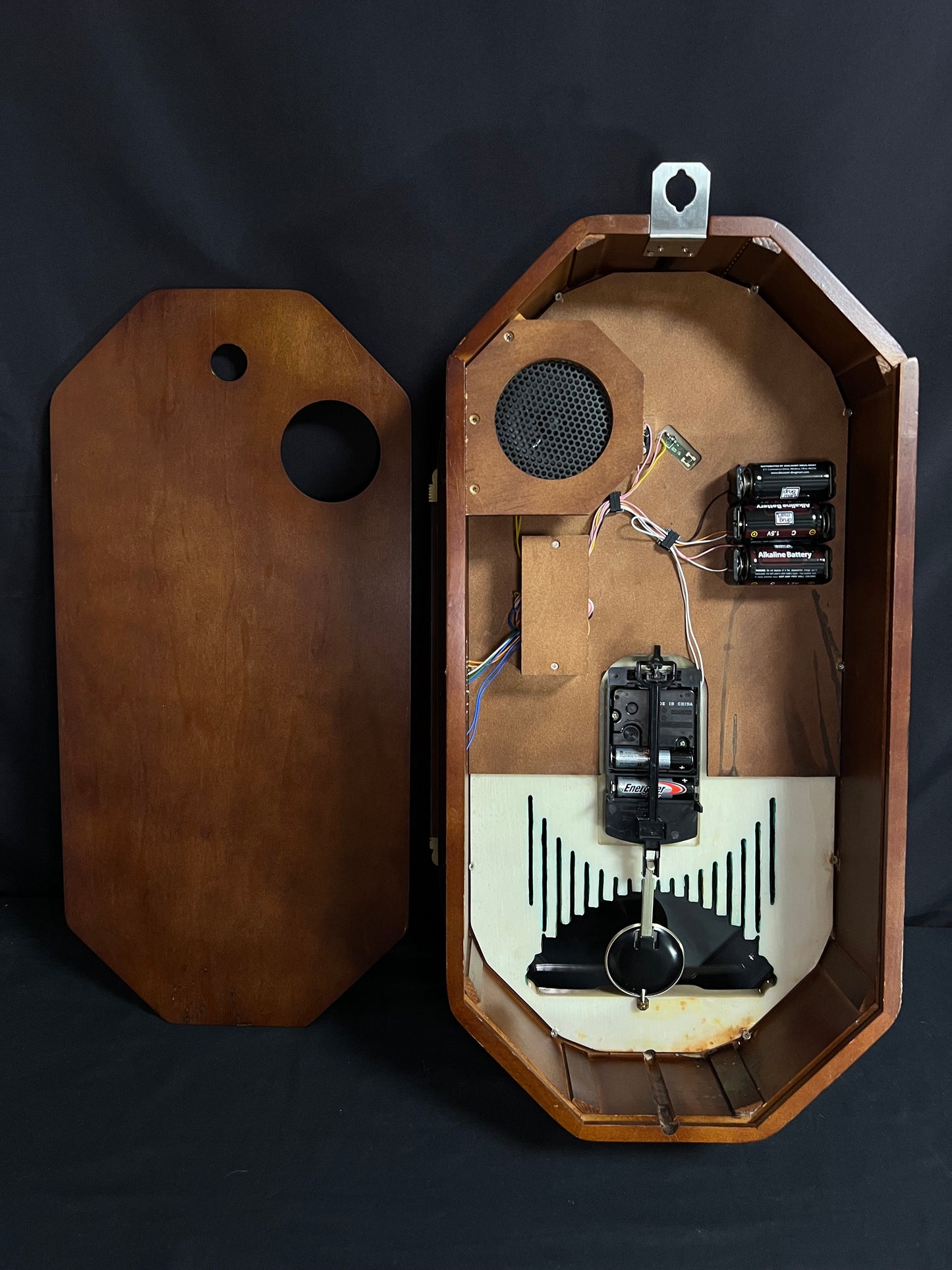Rhythm “CTS Sundial” Gothic Wooden Musical Motion Pendulum Wall Clock with Popular Melodies - CMJ336UR06