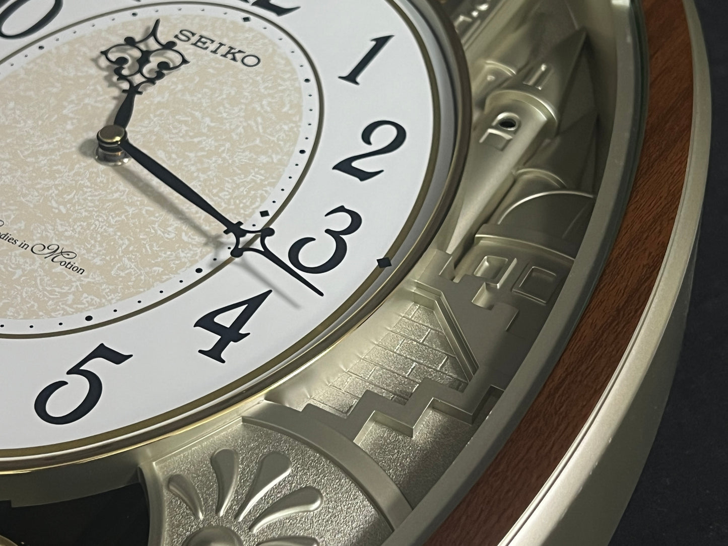 Seiko QXM369BRH “Golden Citadel” Melodies in Motion Musical Decorative Pendulum Wall Clock