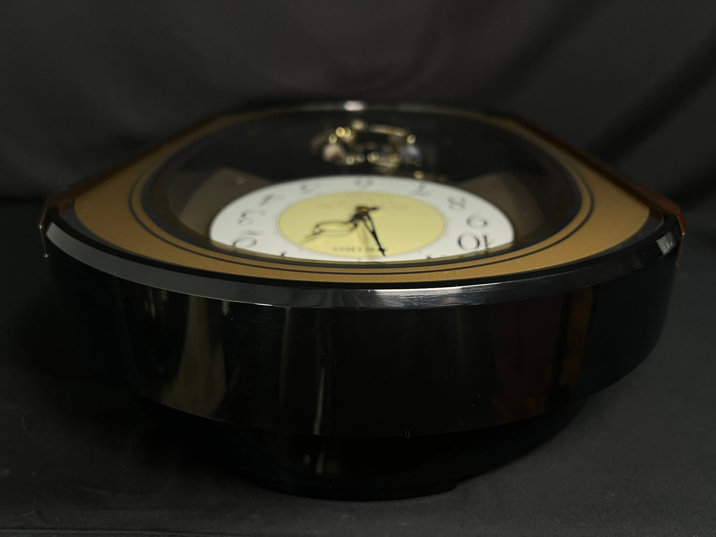 Seiko QXM124GRH "Music Disc Figurines" Melodies in Motion Musical Moving Wall Clock with Popular Music