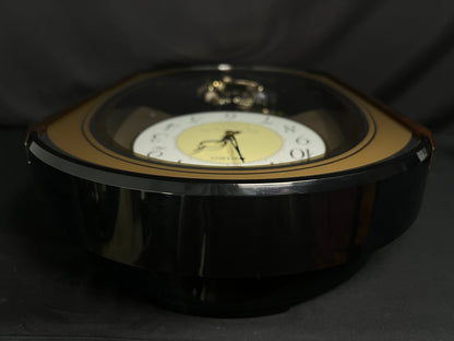 Seiko QXM124GRH "Music Disc Figurines" Melodies in Motion Musical Moving Wall Clock with Popular Music