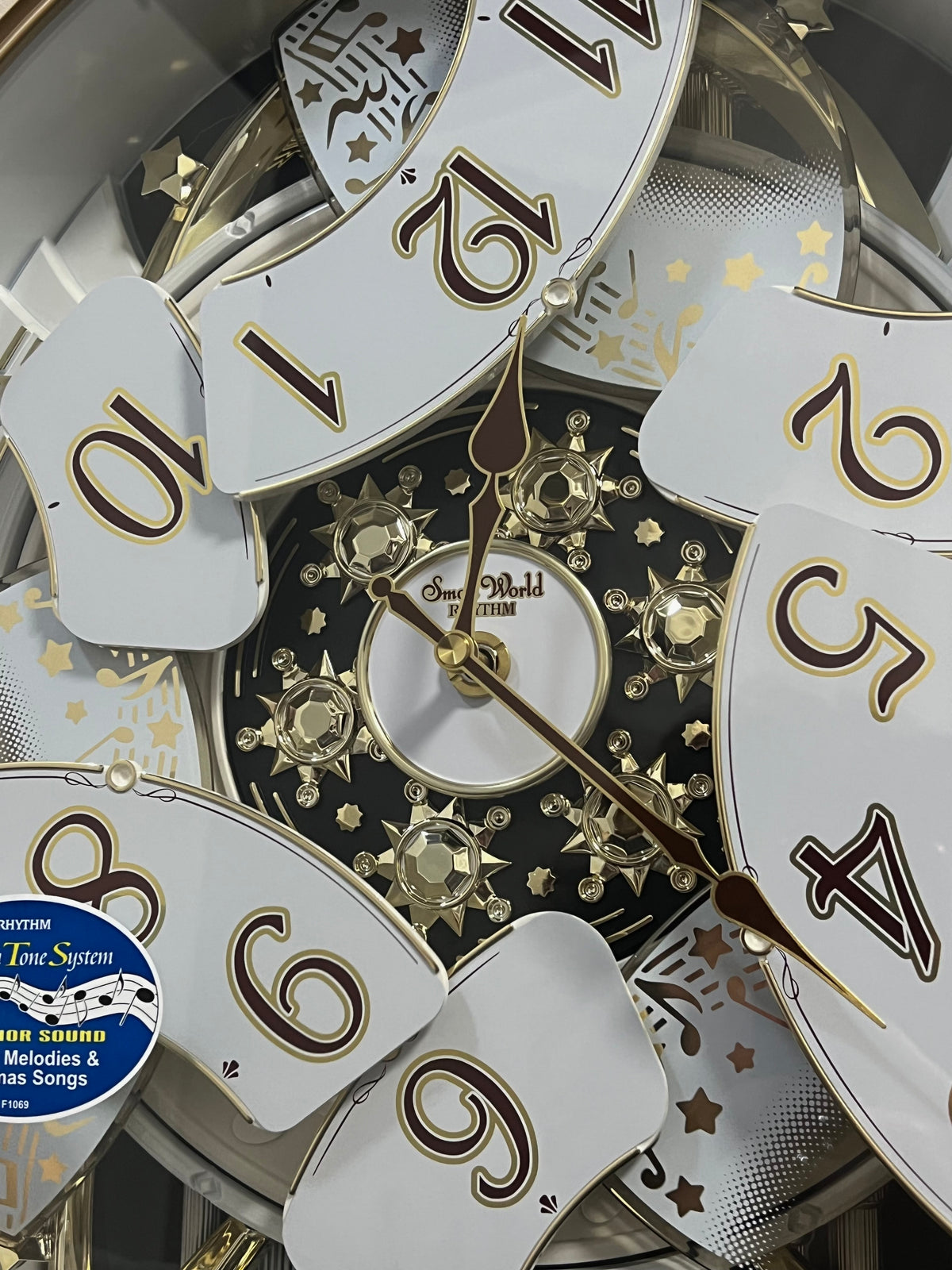Rhythm “Marvelous” Magic Motion Musical Wall Clock with Moving Dial - 4MH842WD18