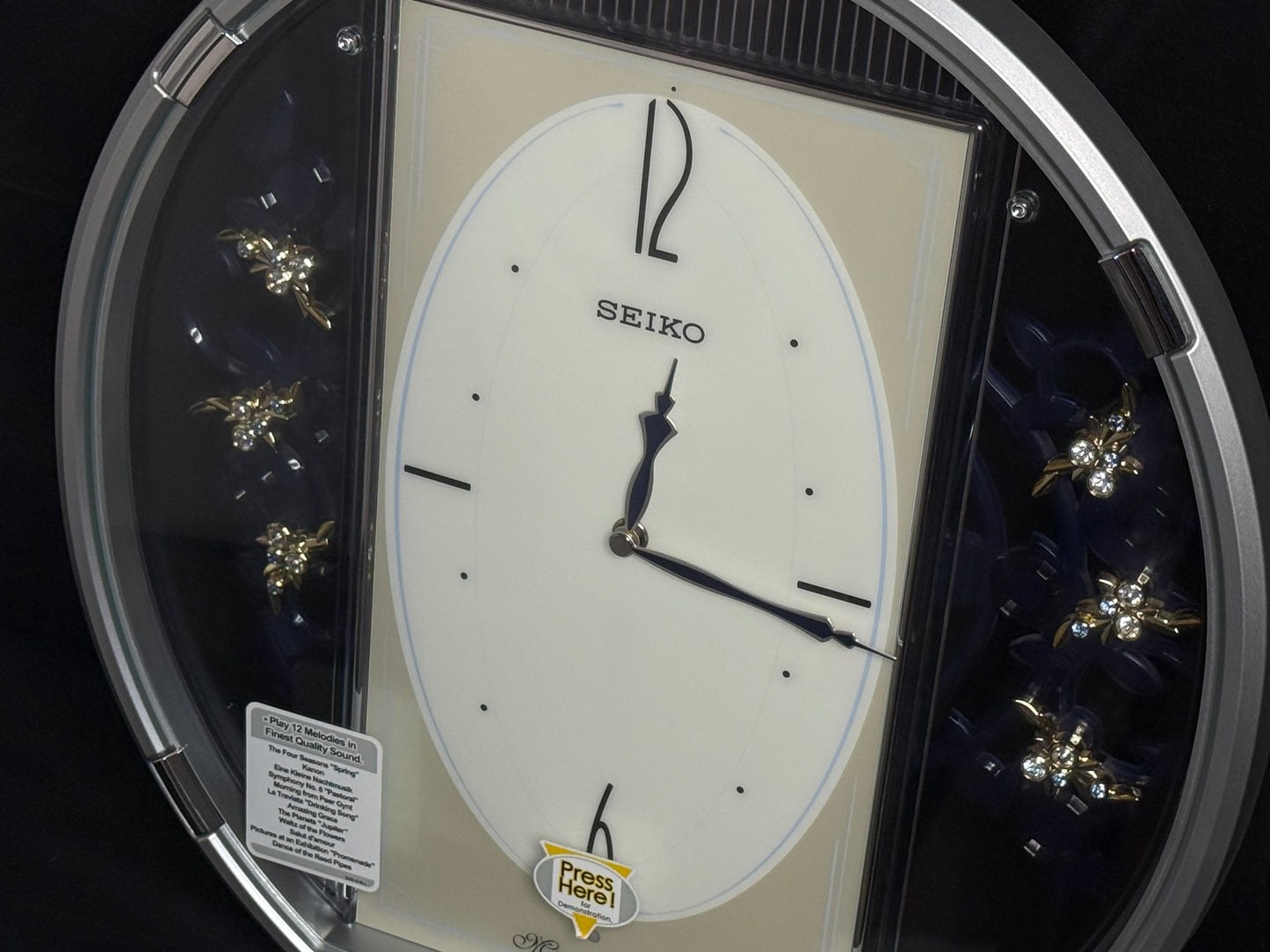 Seiko QXM158SRH "Sparkling Crystals" Melodies in Motion Musical Decorative Pendulum Wall Clock