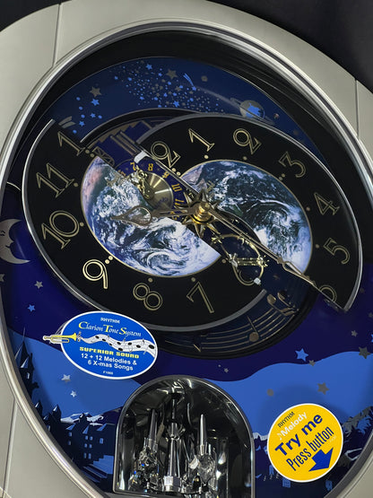 Rhythm “Peaceful Cosmos II” Moving Earth Dial Magic Motion Musical Wall Clock - 4MH408WU19