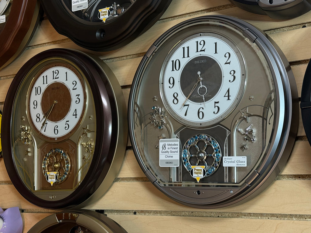 Seiko QXM375SRH "Shooting Stars" Melodies in Motion Musical Decorative Moving Wall Clock with 19 Songs
