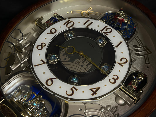 Seiko QXM160BRH “2008 Special Collector's Edition" Melodies in Motion Musical Moving Wall Clock with Music by The Beatles
