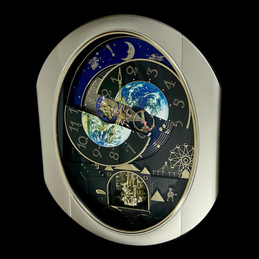 Rhythm “Peaceful Cosmos” Moving Earth Dial Magic Motion Musical Wall Clock with Popular Melodies - 4MH751AR19