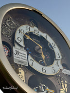 Seiko QXM620GRH "Golden Festival" Melodies in Motion Dancing Dial Musical Wall Clock with 30 Songs