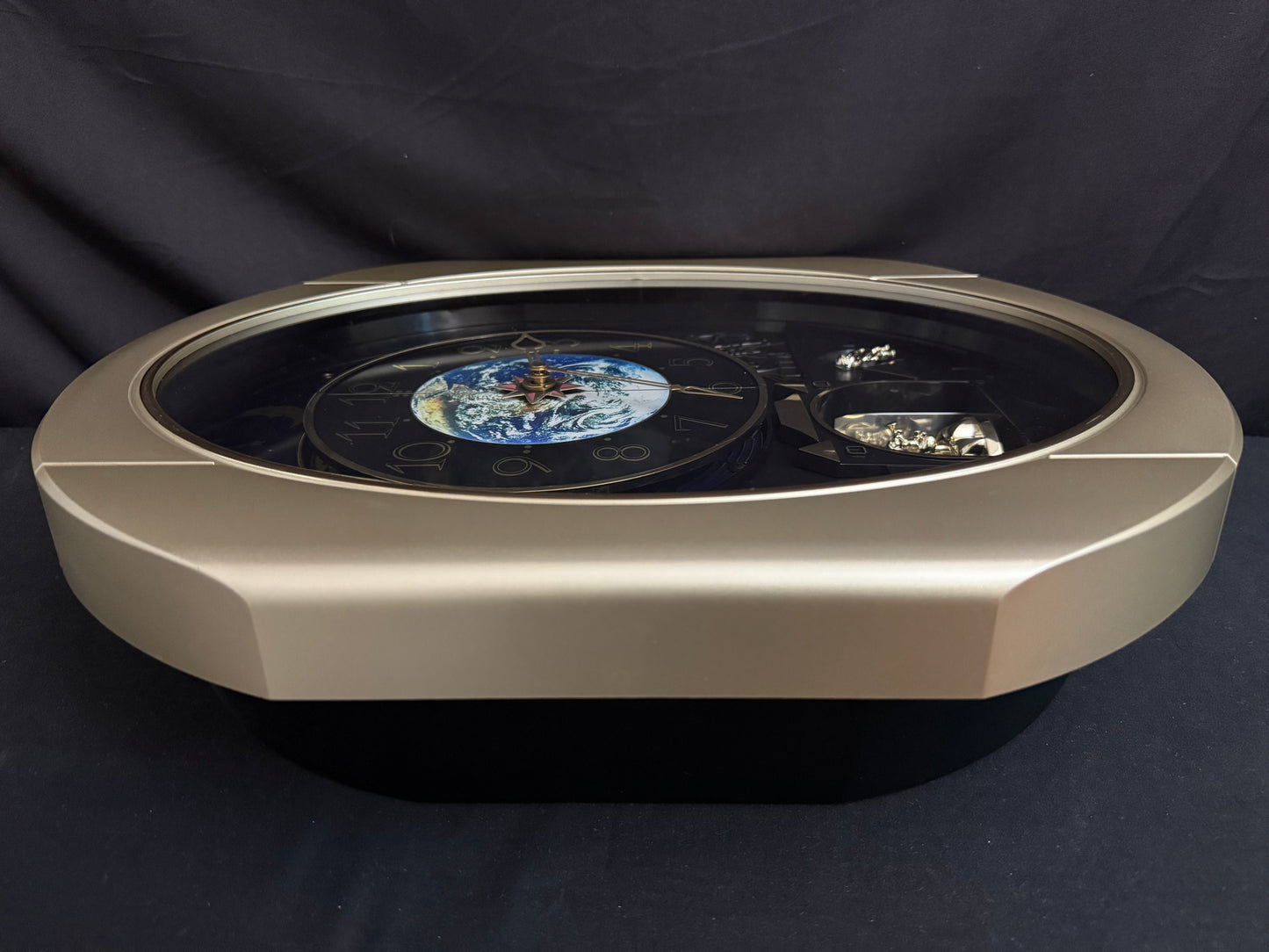 Rhythm “Peaceful Cosmos” Moving Earth Dial Magic Motion Musical Wall Clock with Popular Melodies - 4MH751AR19