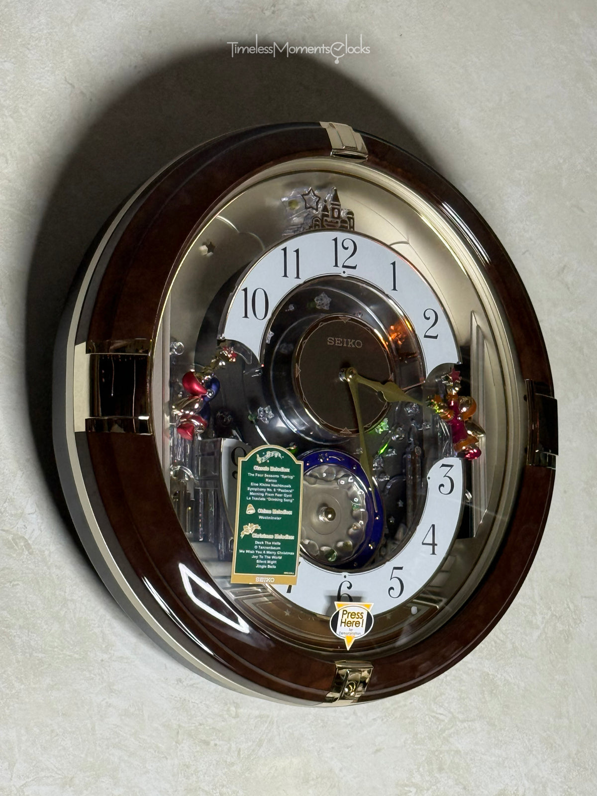 Seiko QXM333BRH "Trumpeting Angels" Melodies in Motion Jaw-Dropping Dial Musical Moving Wall Clock with 13 Songs