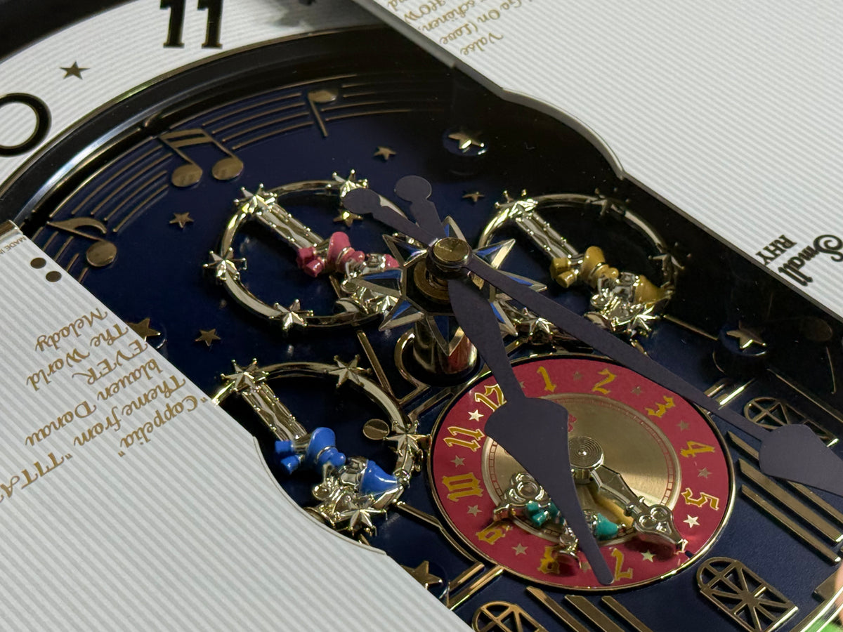 Rhythm “Small World Partage Home (Blue)” Moving Dial Magic Motion Musical Wall Clock with Popular Melodies - 4MH754RH04